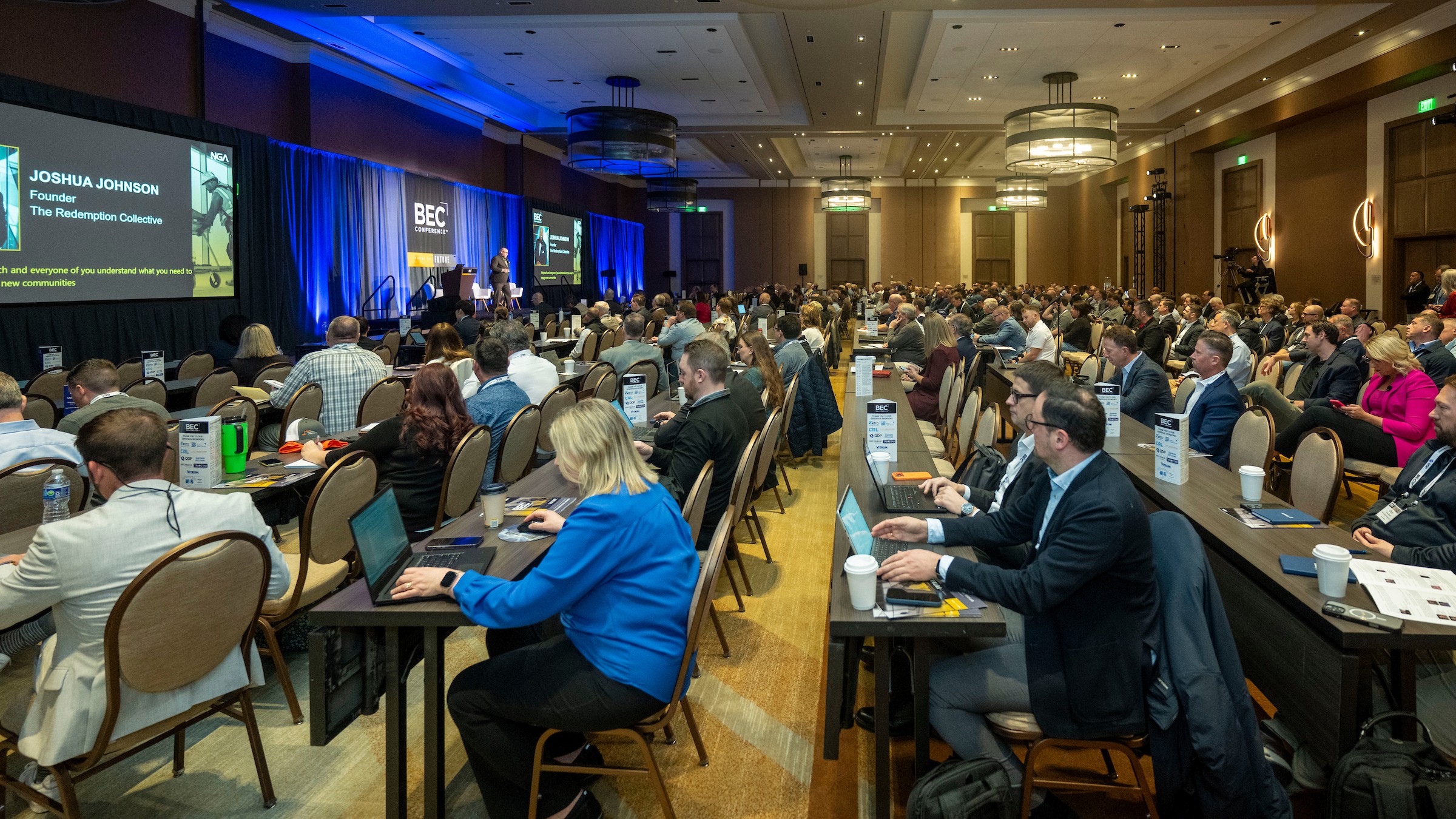 Speaker presenting to a full session room at BEC Conference 2025