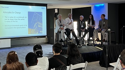 panelists address architects during an event