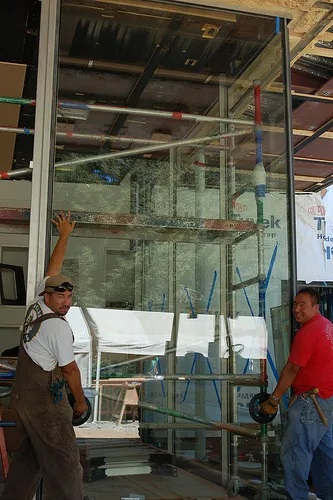 glaziers install heavy glass
