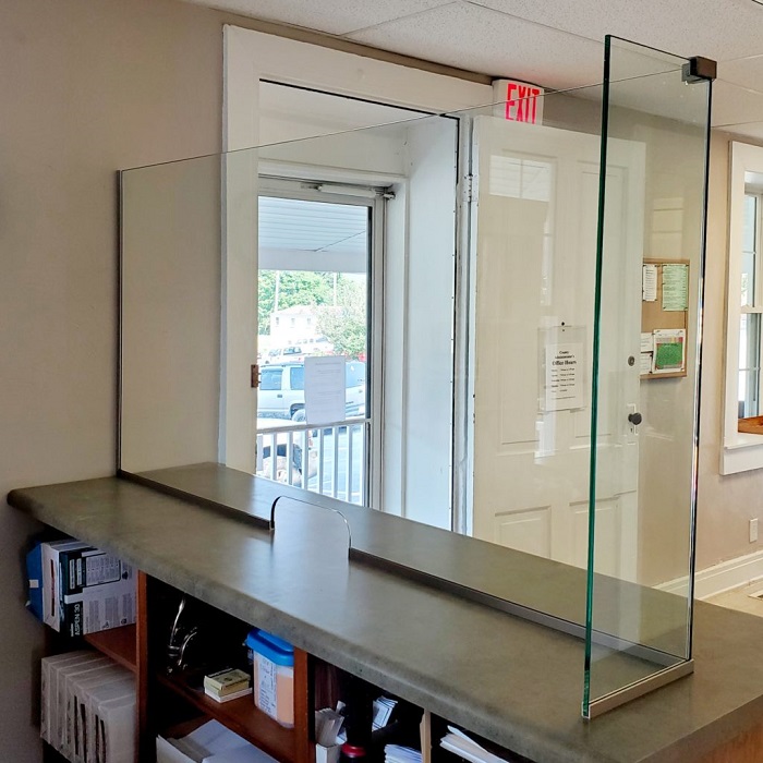protective glass barrier on counter