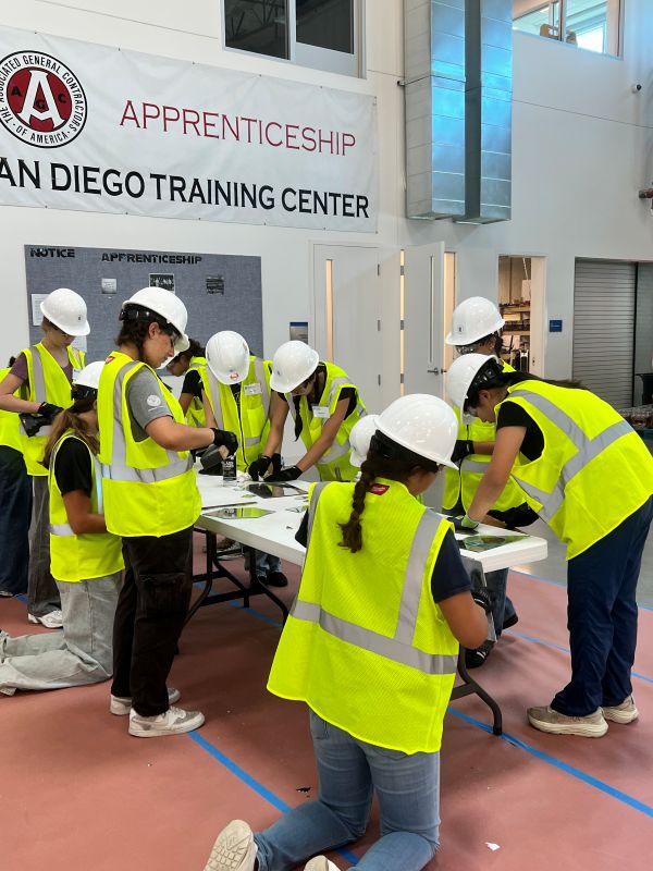 working with mirrors at construction camp