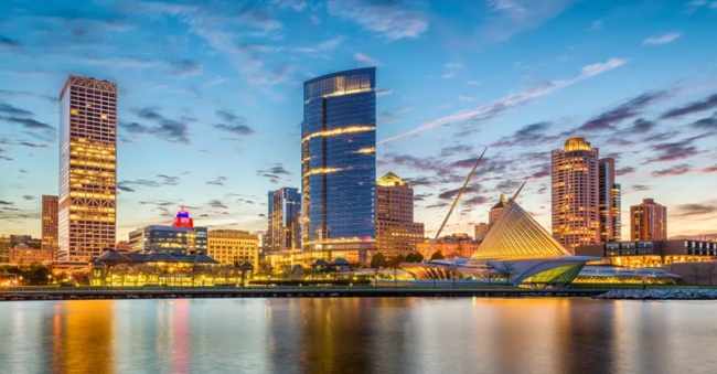 A scene of the Milwaukee skyline at sunset