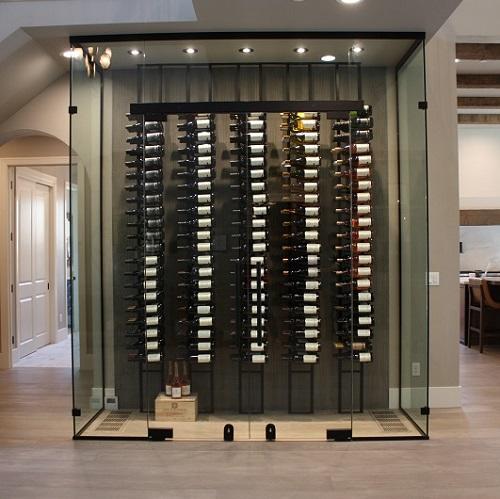 freestanding, decorative glass wine room with wall of bottles