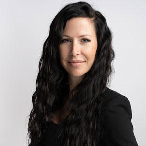 woman with long dark curly hair