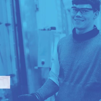 young person with safety glasses and gloves working with glass